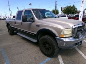 1999 Ford 4X4 F-350 Lariat CrewCab Longbed Photo 2