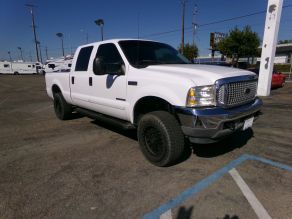 2002 Ford Crew Cab Short bed F-250 XLT 4X4 Diesel Photo 2